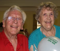 People having fun at a Mcmillian coffee morning